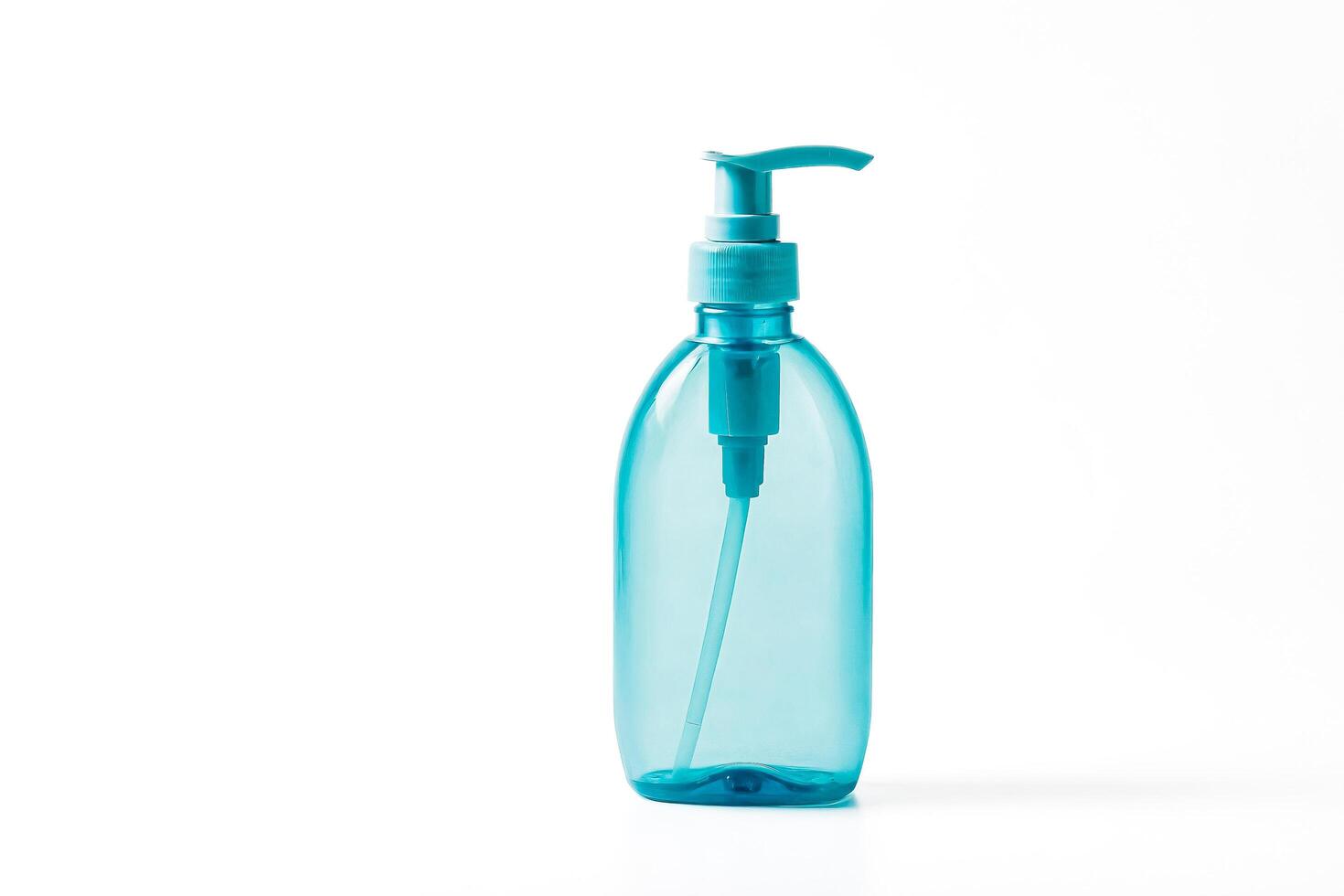 Blue Plastic Bottle with Pump Dispenser on White Background photo