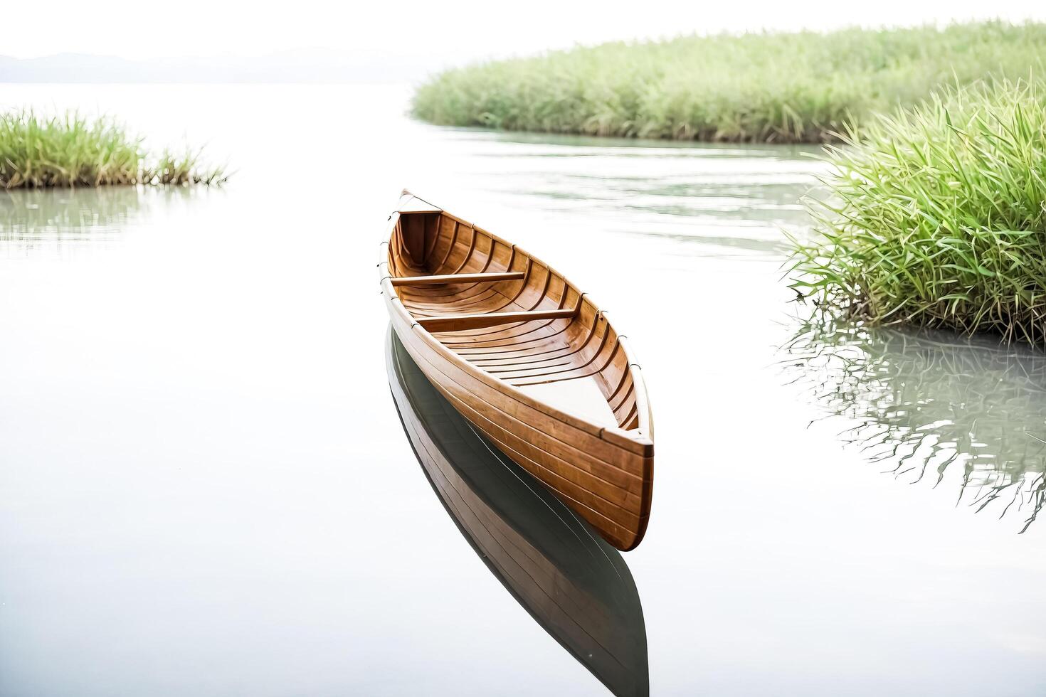 Wooden Canoe on Still Water photo