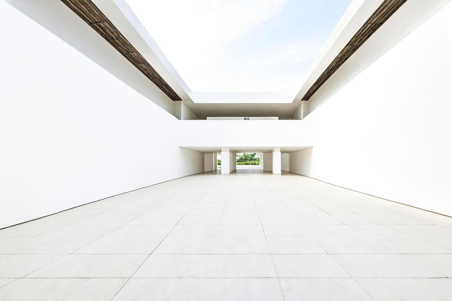 Minimalist Architectural Interior with Open Corridor and Natural Light photo