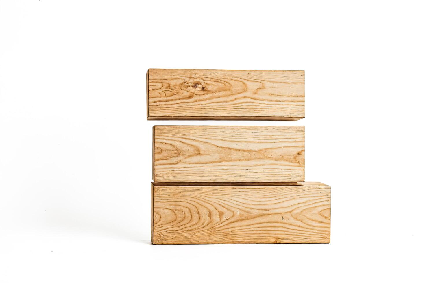 Stack of Wooden Blocks on White Background photo