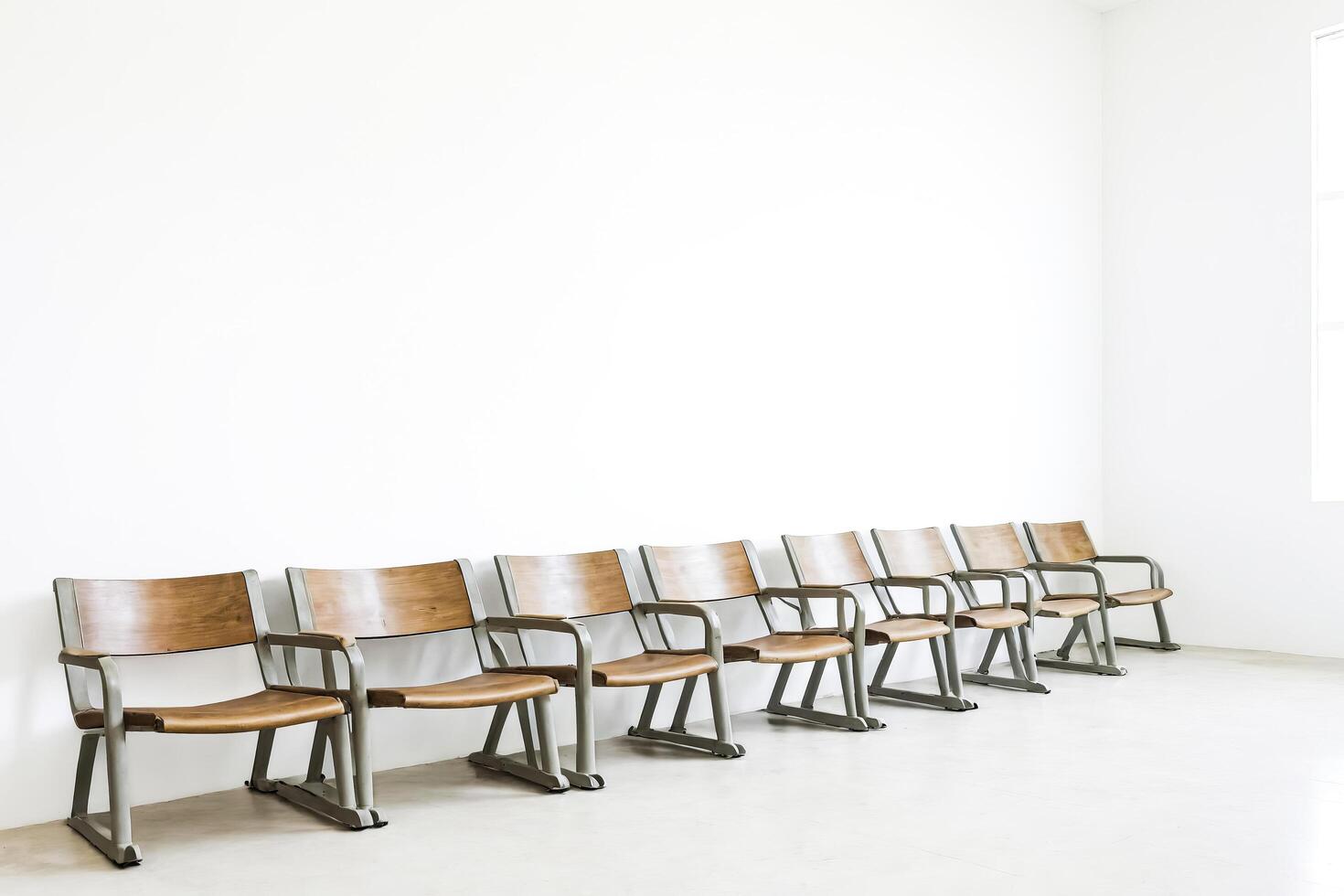 Row of chairs in a waiting room photo