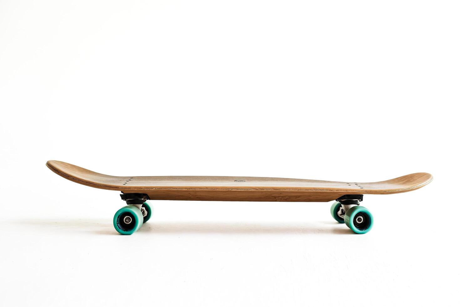 Wooden Skateboard on White Background photo