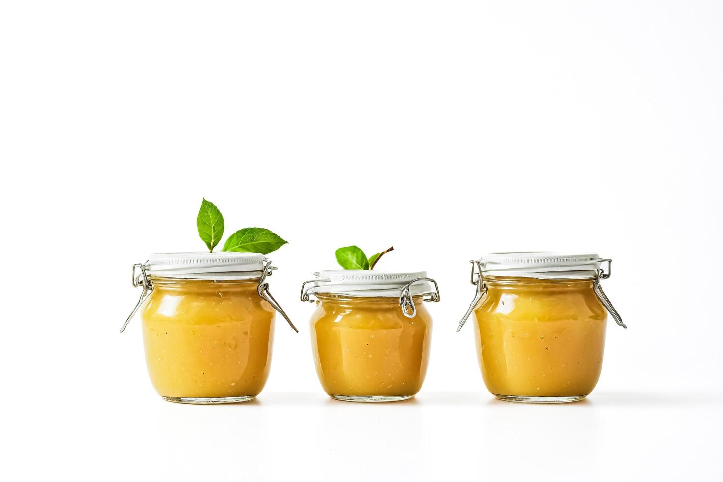 Three Jars of Homemade Applesauce photo