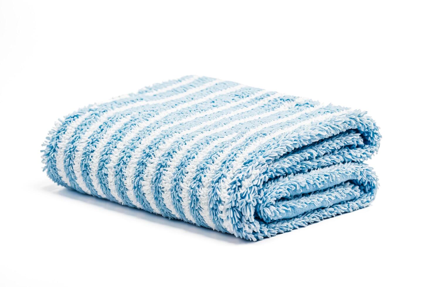 Folded Blue and White Striped Towel photo