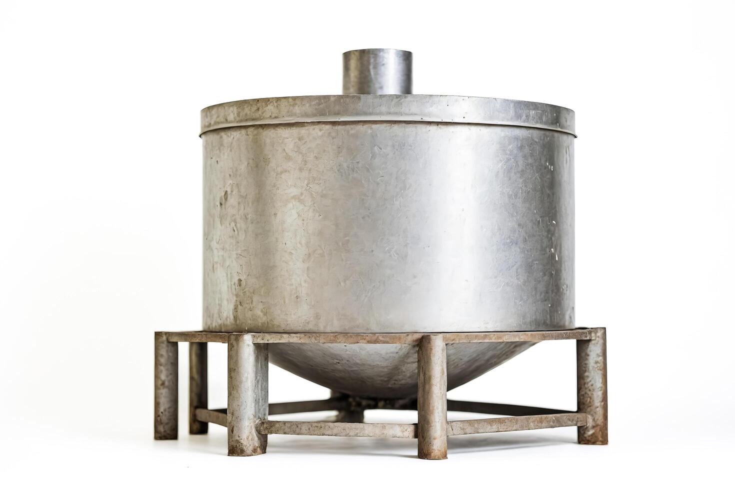 Stainless steel tank with a conical bottom on a metal frame photo