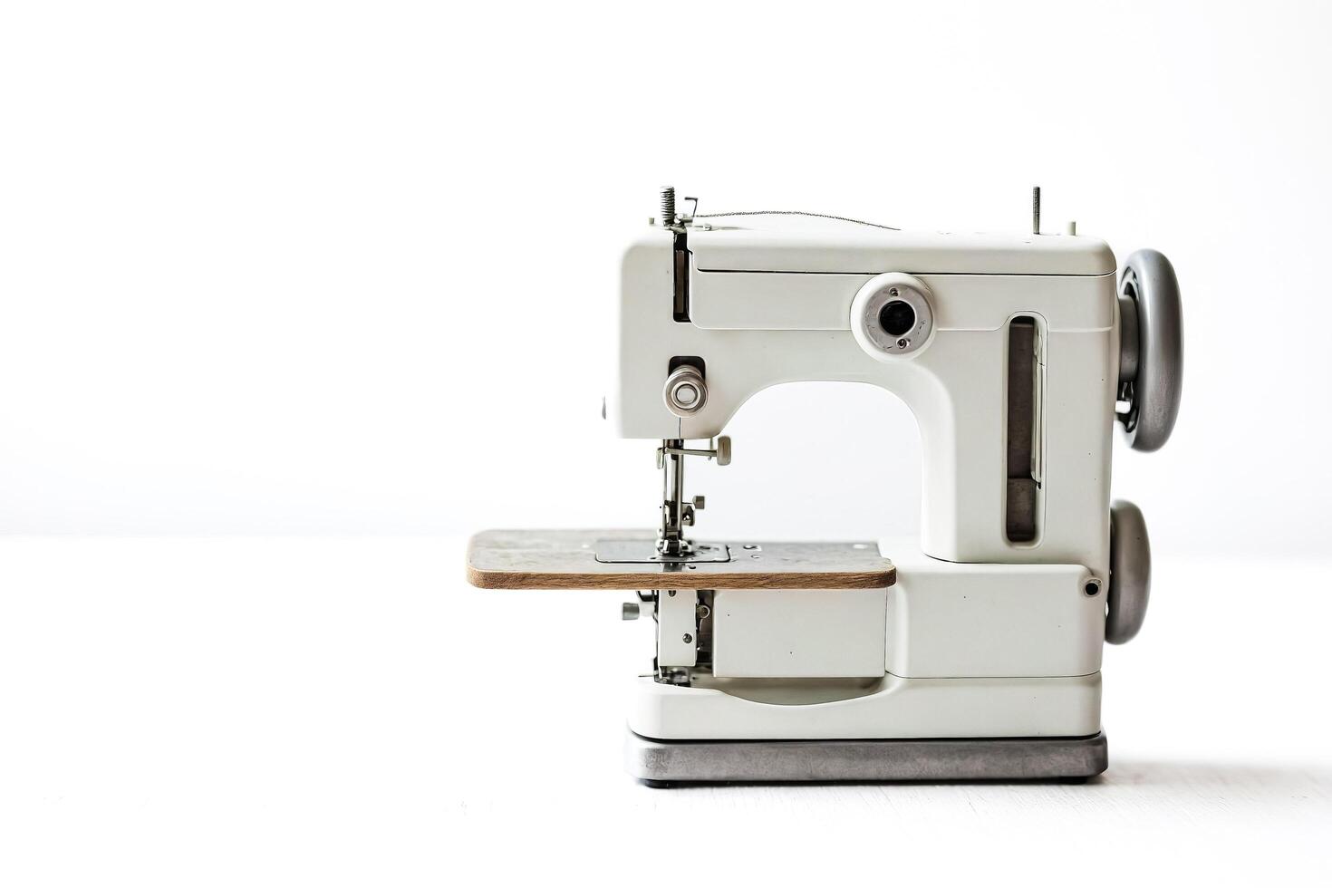 White Sewing Machine on White Background photo