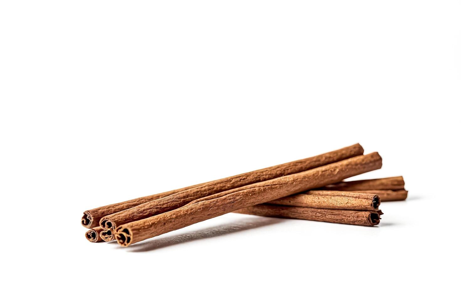 Cinnamon Sticks Isolated on White Background photo