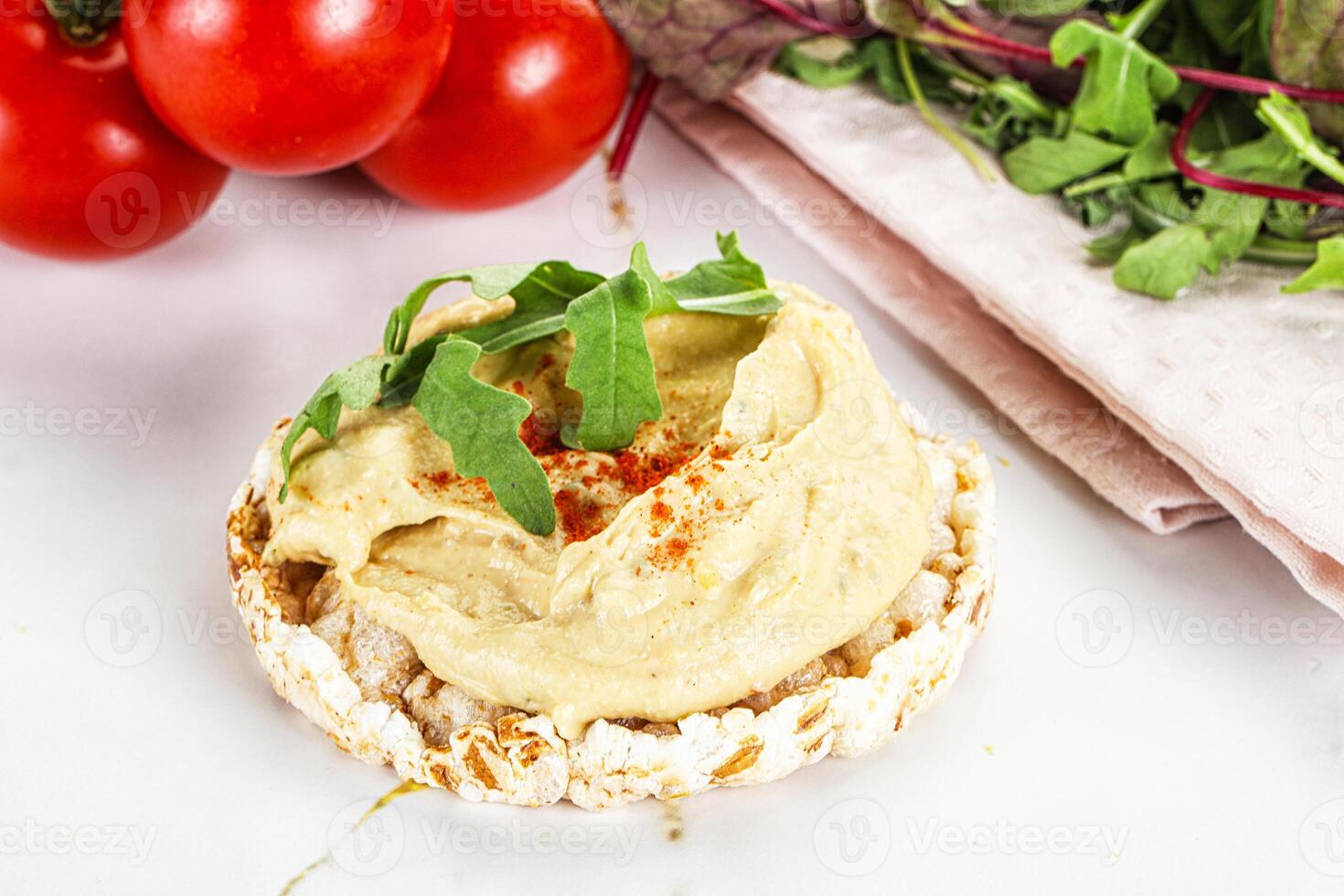 Crispbread with arabic creamy hummus photo