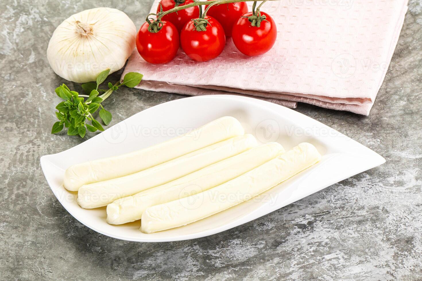 Mozzarella cheese stick heap snack photo