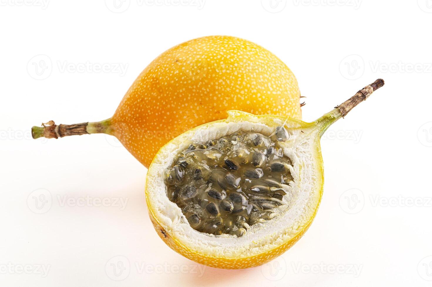 Yellow granadilla with cut half photo