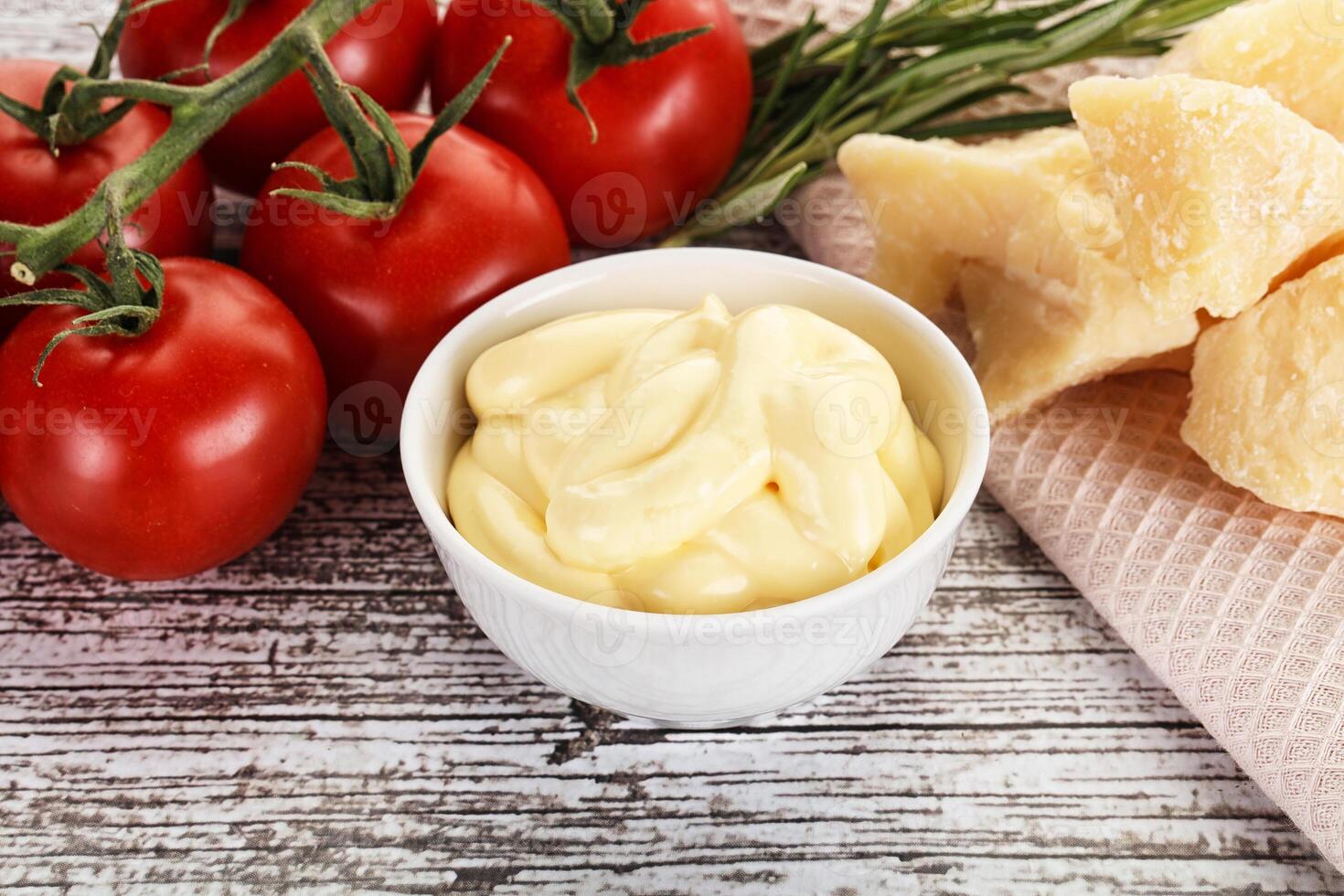 Cheese sauce in the bowl photo