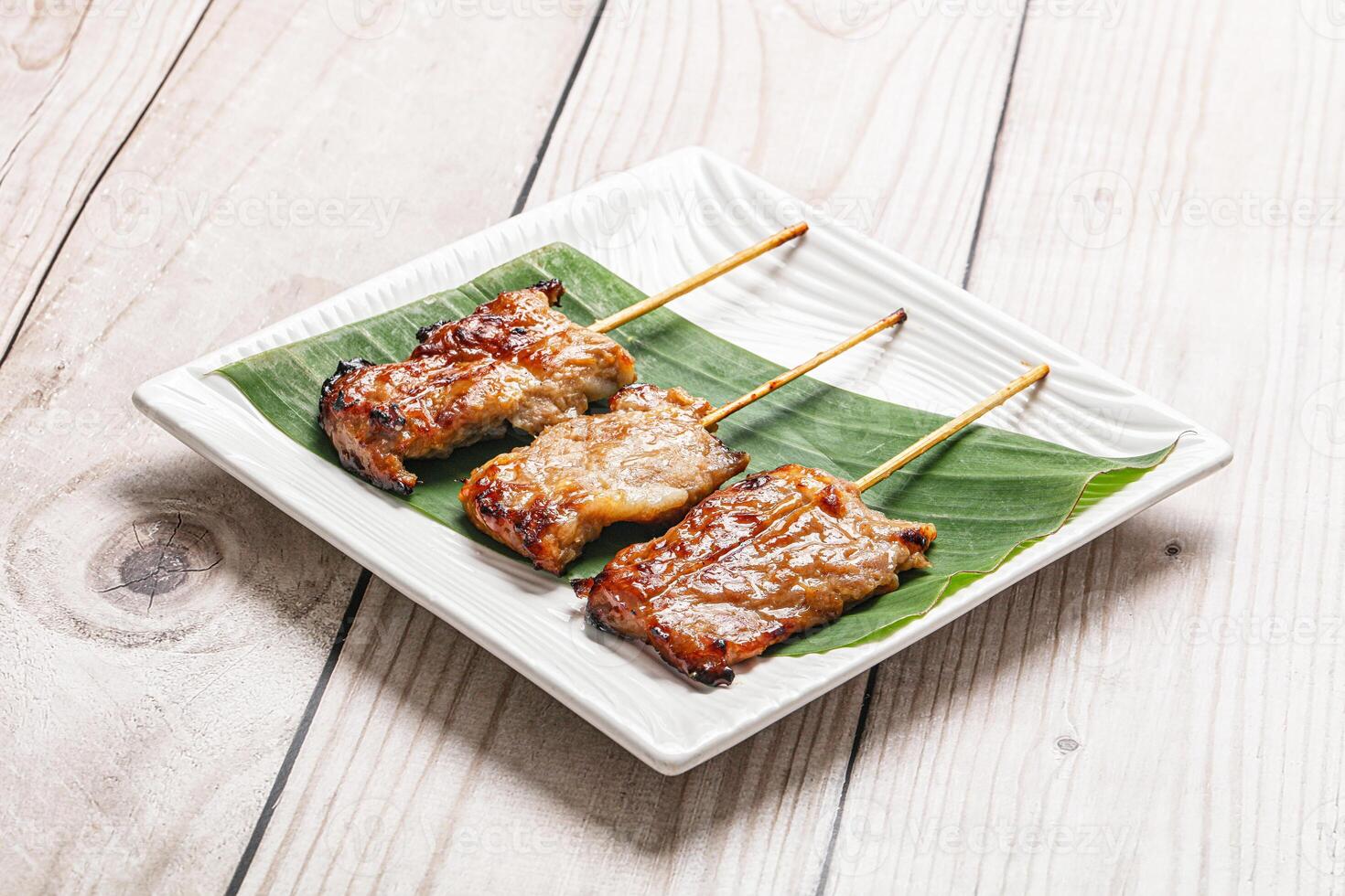 Thai cuisine - grilled pork skewer photo