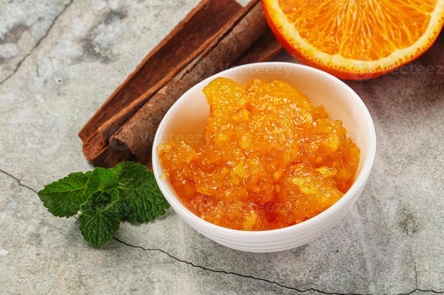 Tasty homemade Orange jam in the bowl photo