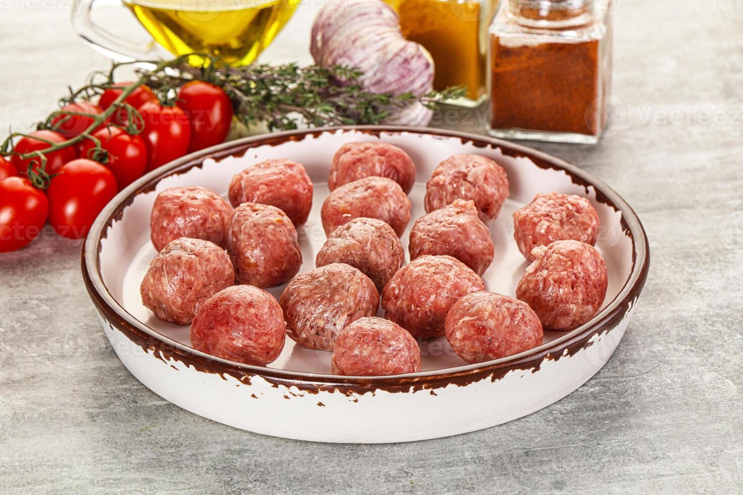 Uncooked raw beef meatball minced photo