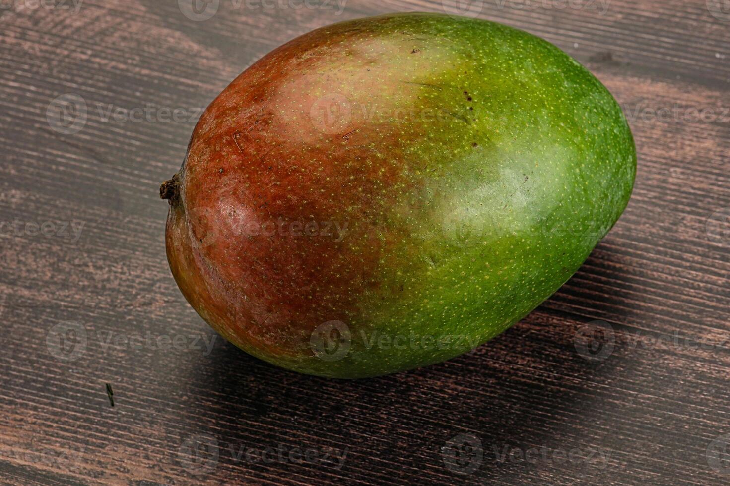 Sweet juicy green and red mango photo
