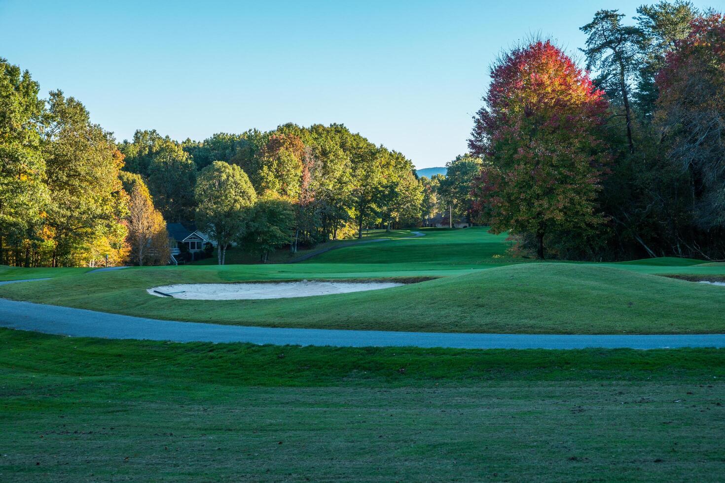 Sun setting at the golf course photo