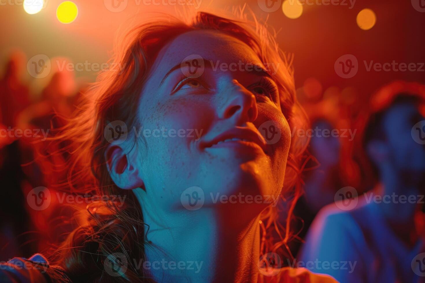silhouette of african american woman in neon light on rock concert. photo