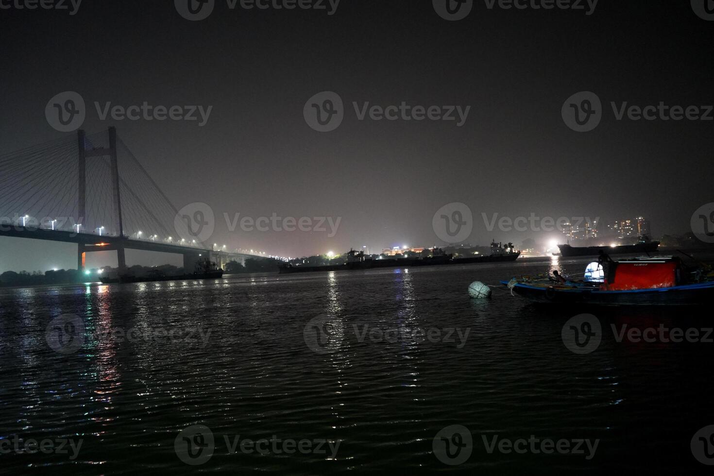 Landscape of Second Hooghly Bridge or Vidyasagar Setu at Night photo