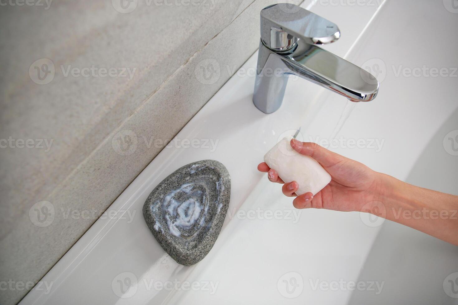 The wet soap has gone sour in the soap dish. photo