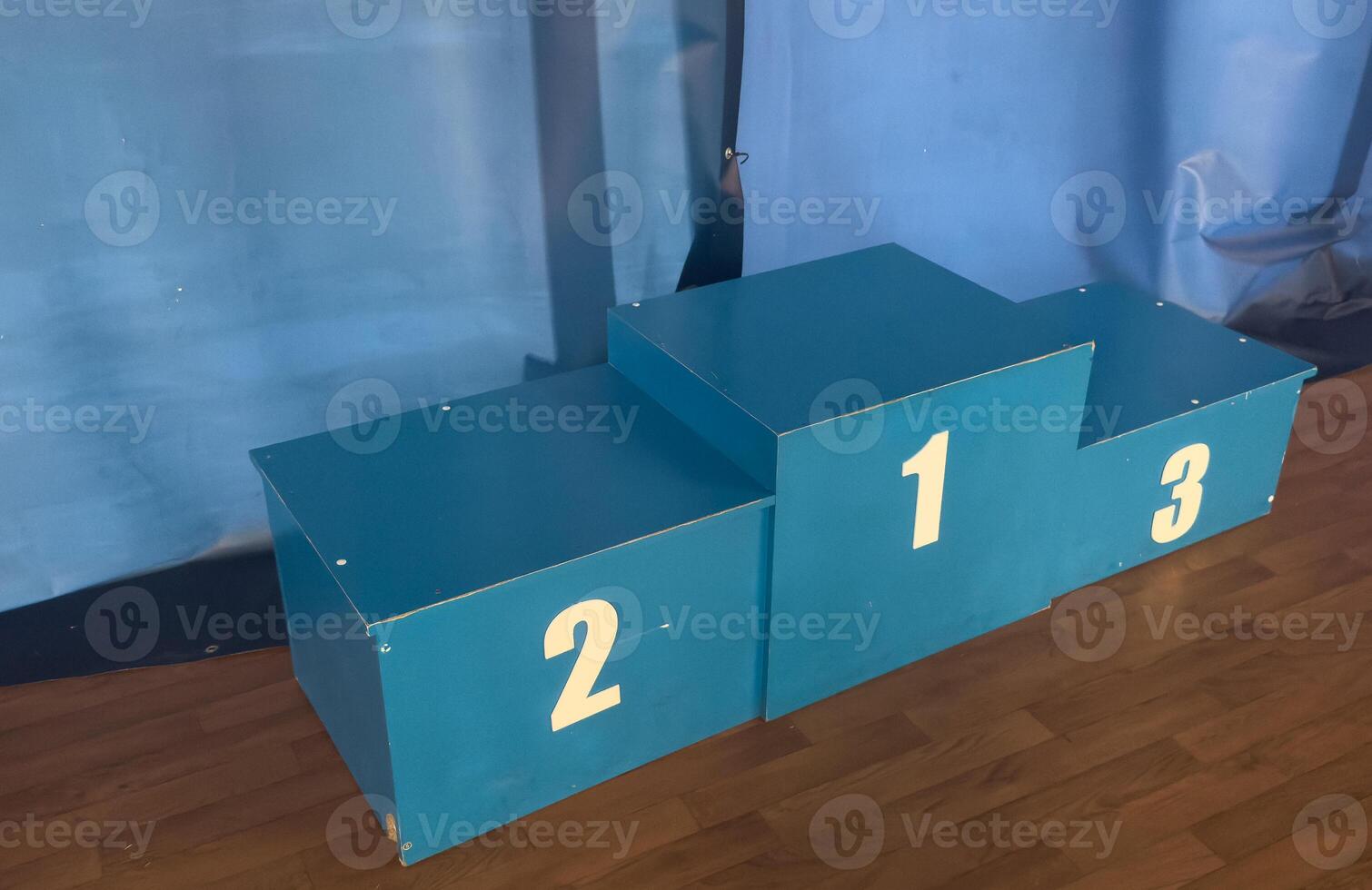 Winners pedestal for the first three prizes places. First second and third place. Competition concept. Summing up the results of contest. Summarize and determine the who is best. photo