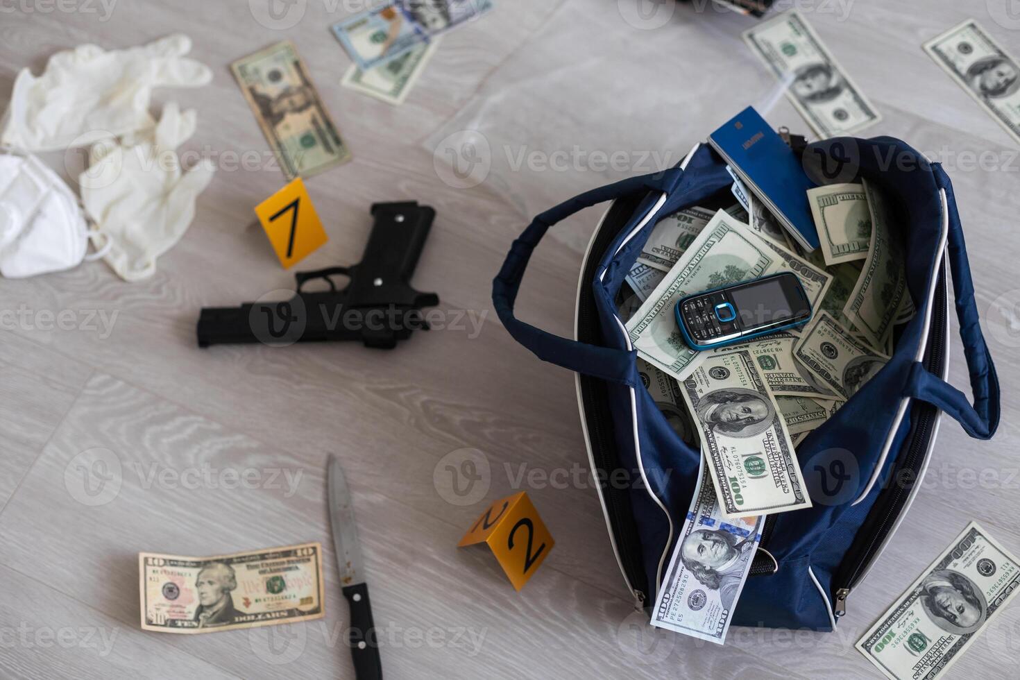 Handcuffs on many stacks of dollar bills. Metal suitcase with money, concept of arrest, investigation and fraud. photo