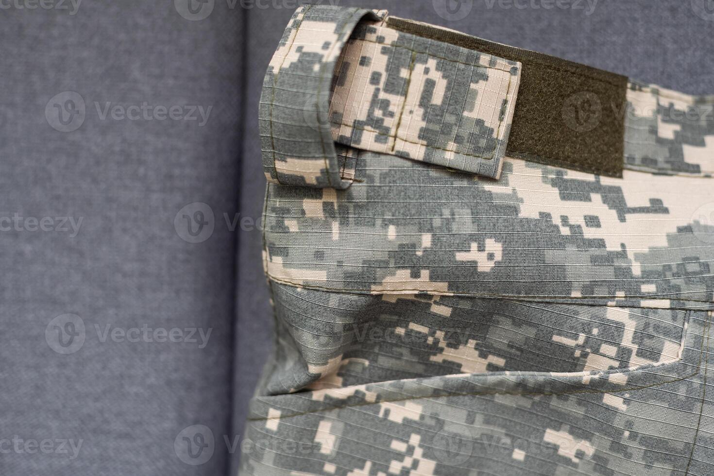Ukraine Army uniform insignia badges on camouflaged uniform background. photo