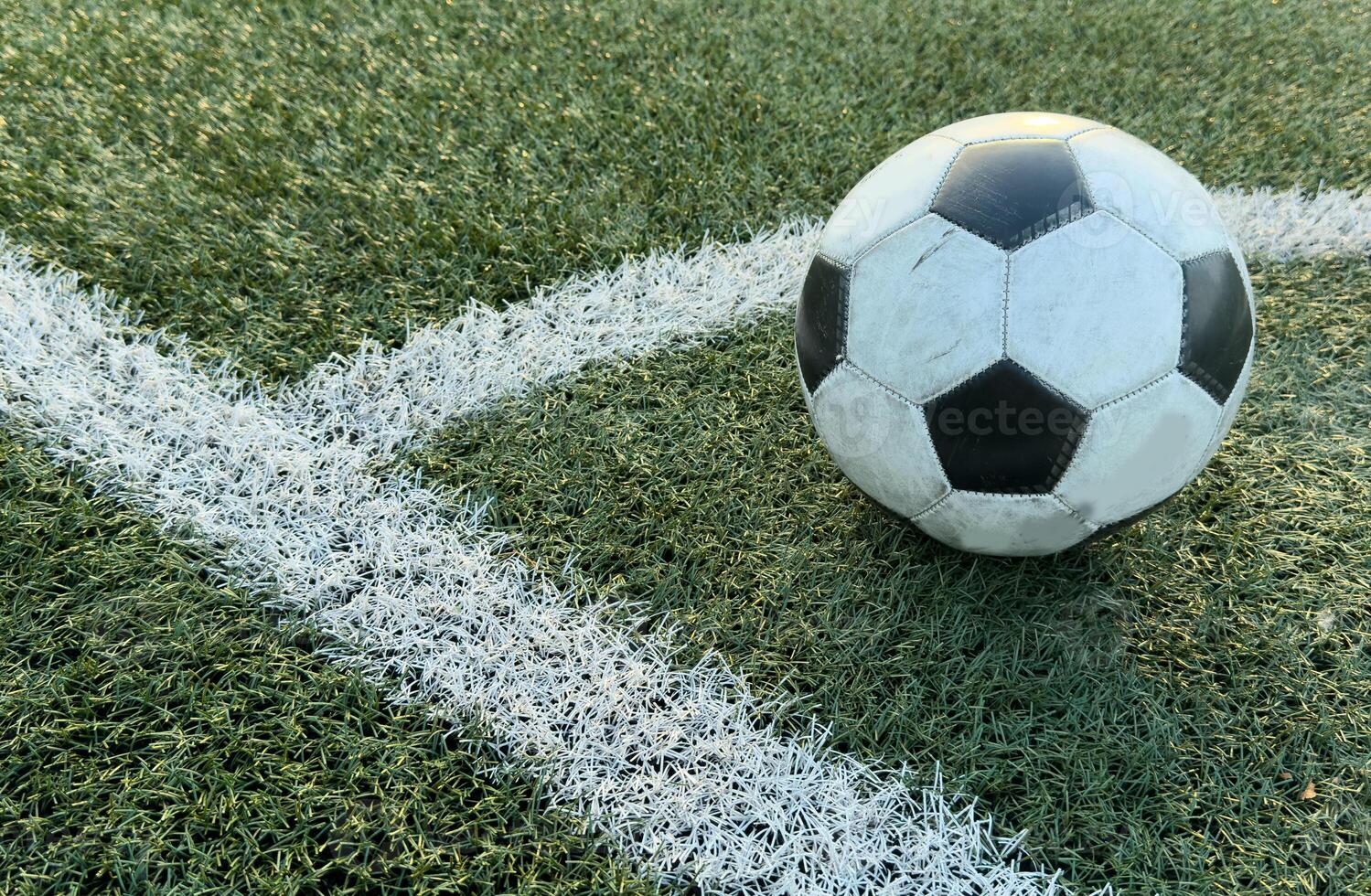 soccer Football on Corner kick line of ball and a soccer field , football field , background texture photo