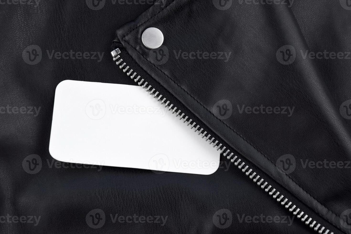 Black leather jacket with white tag and LC Waikiki logo. photo