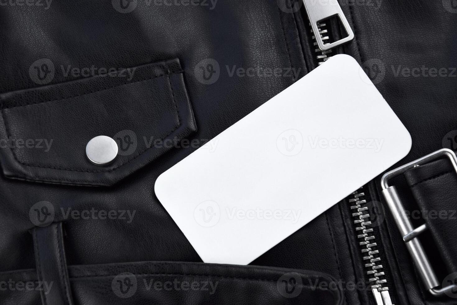 Black leather jacket with white tag and LC Waikiki logo. photo