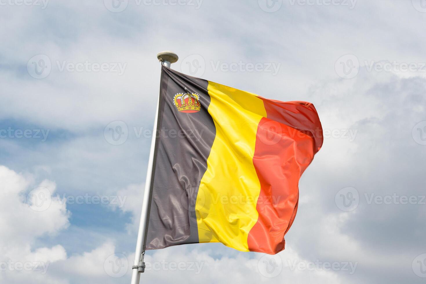Blue skies and the Belgian flag. horizontal photo