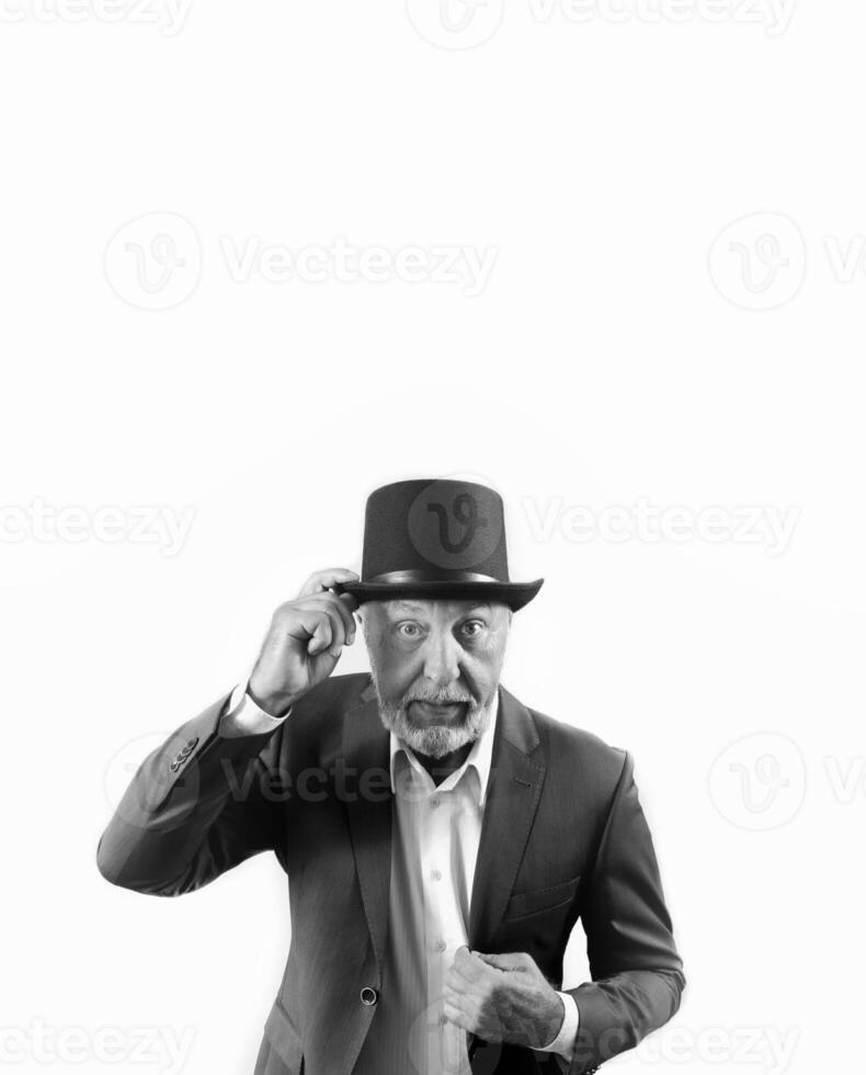 Imposing elderly man in a suit and a top hat. black and white. copy space. vertical photo