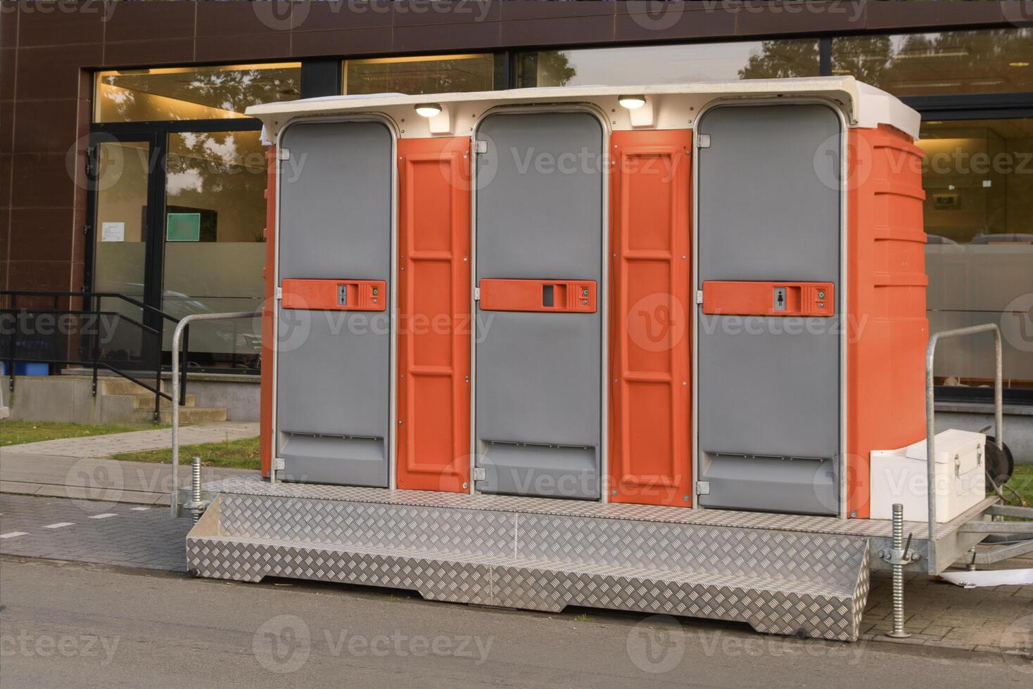 Mobile, mobile, temporary toilet for the public installed on a city street photo