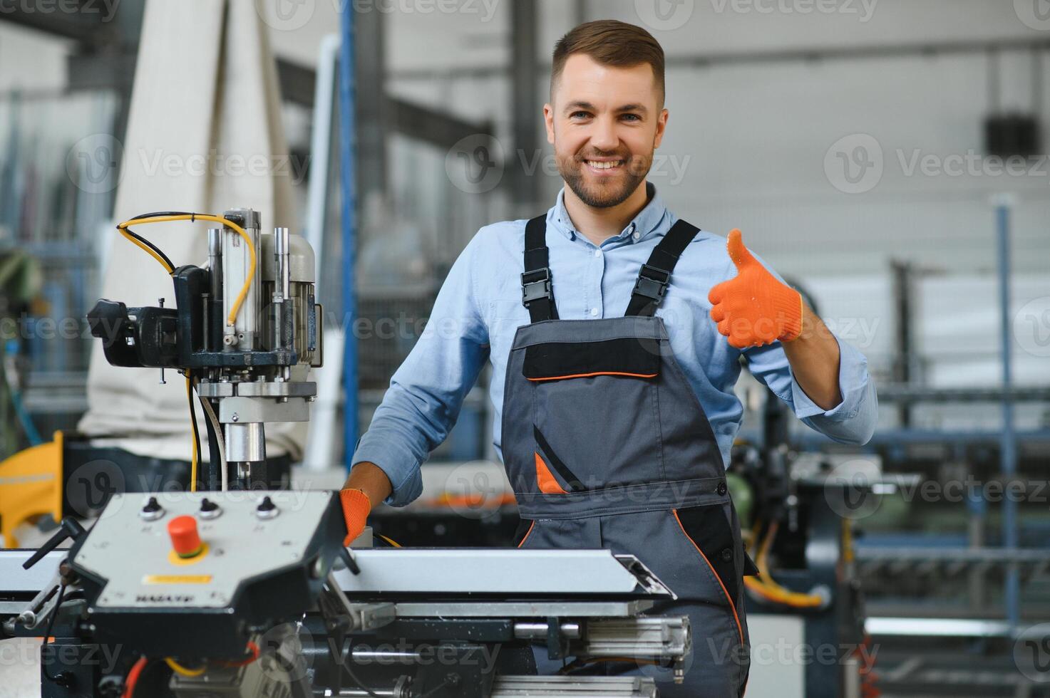 Factory worker. Man working on the production line. photo