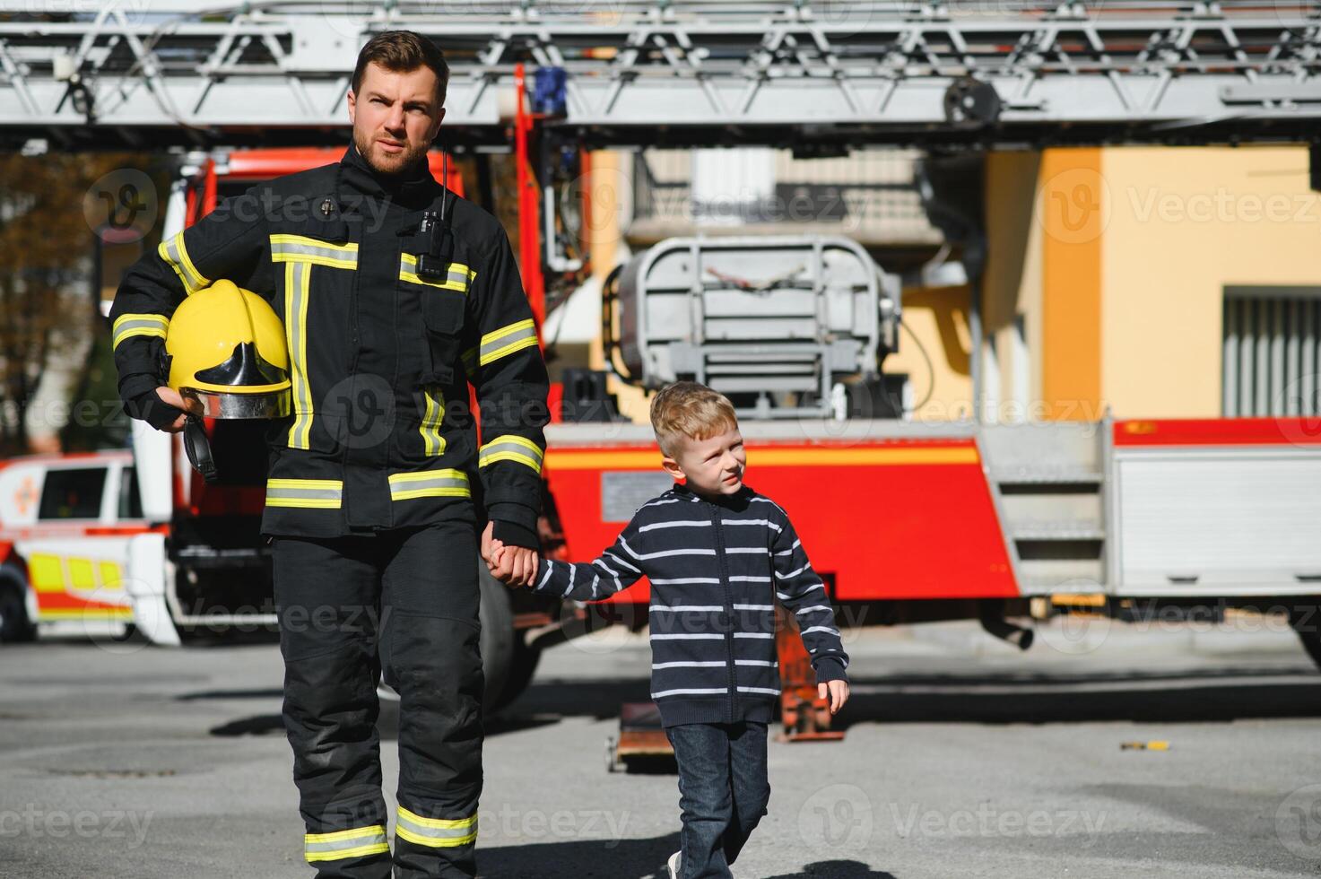 Protect people from dangerous with brave heart.Hero in fireman with uniform safe children from burn smoke photo