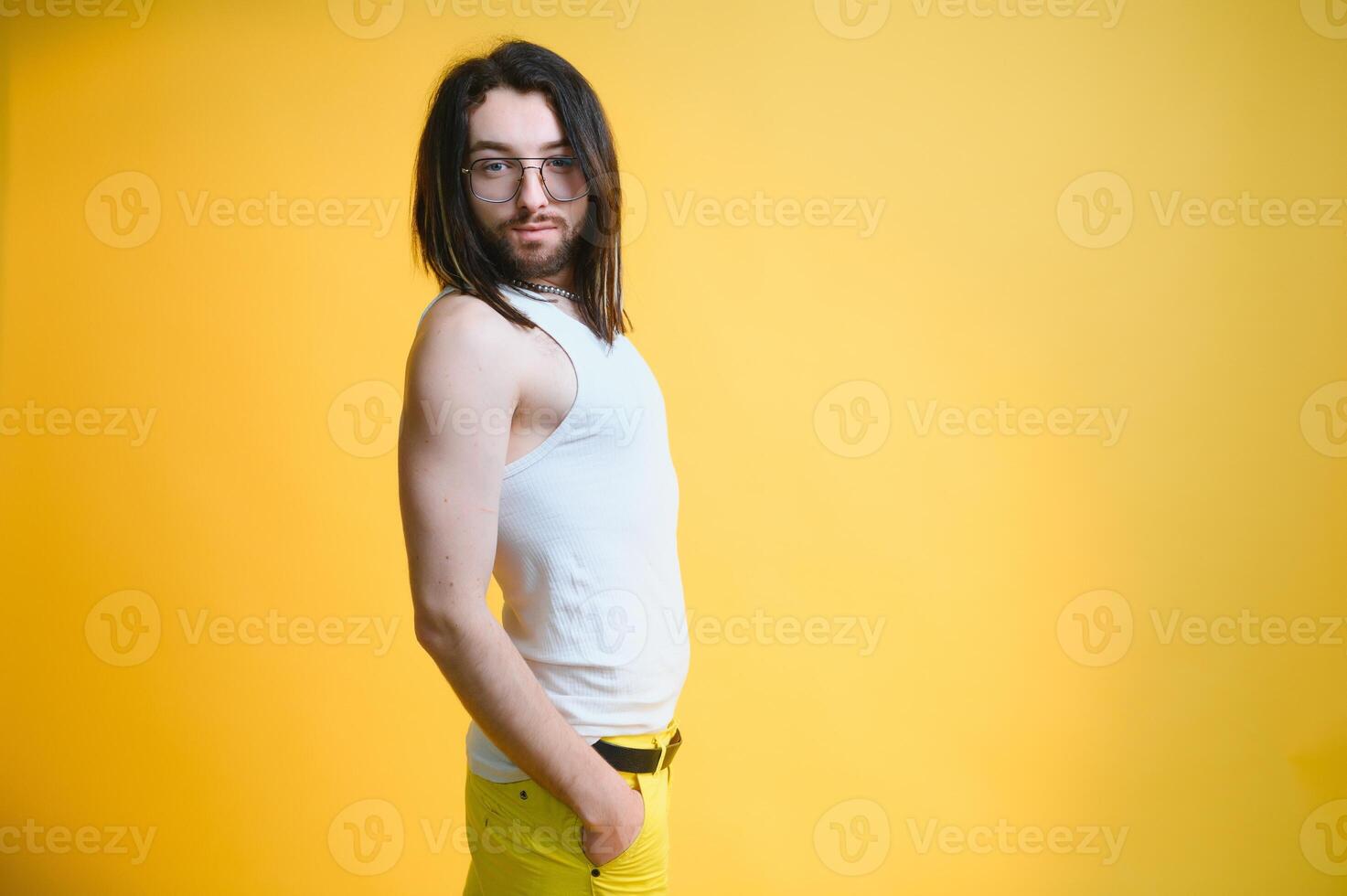 Portrait of a gay man on a colored background. Gender equality. The concept of the LGBT community. Equality. photo
