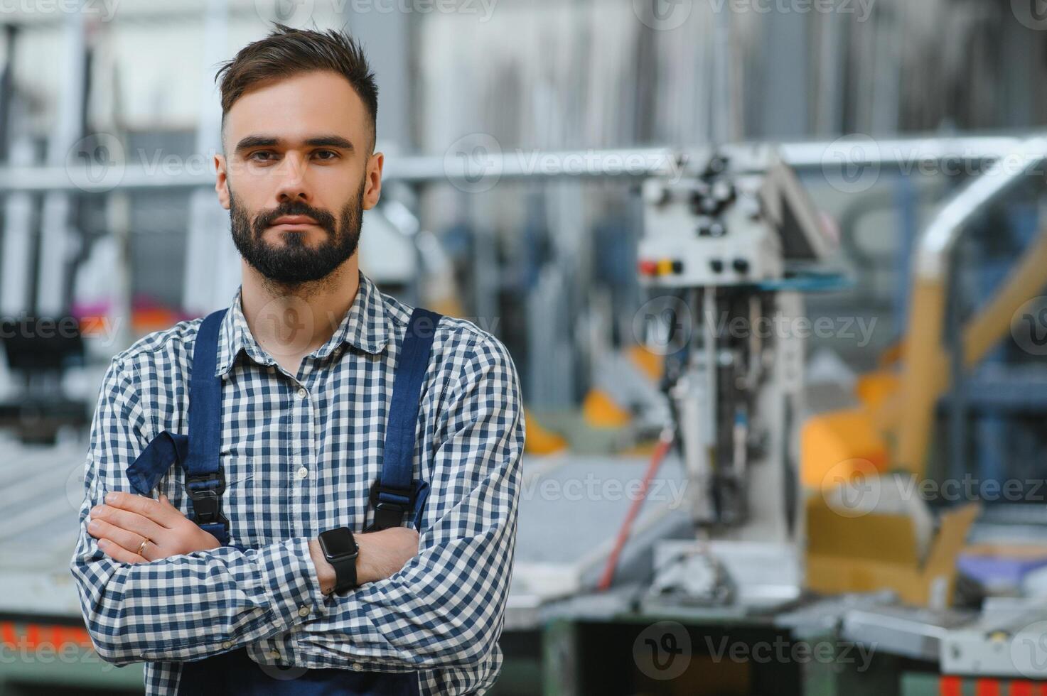 Factory worker. Man working on the production line. photo