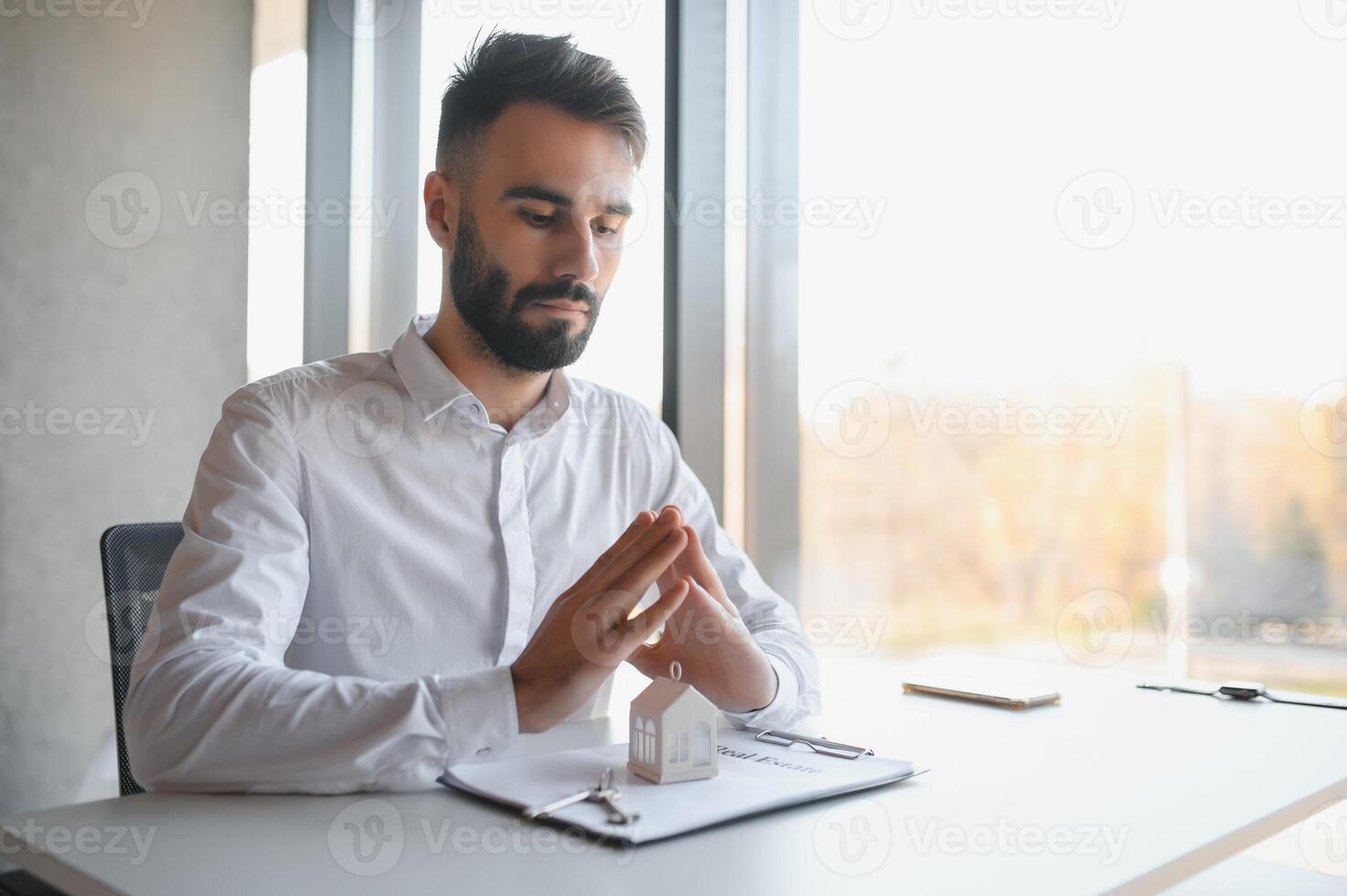 Realtor at work. Sale and rent of real estate. photo