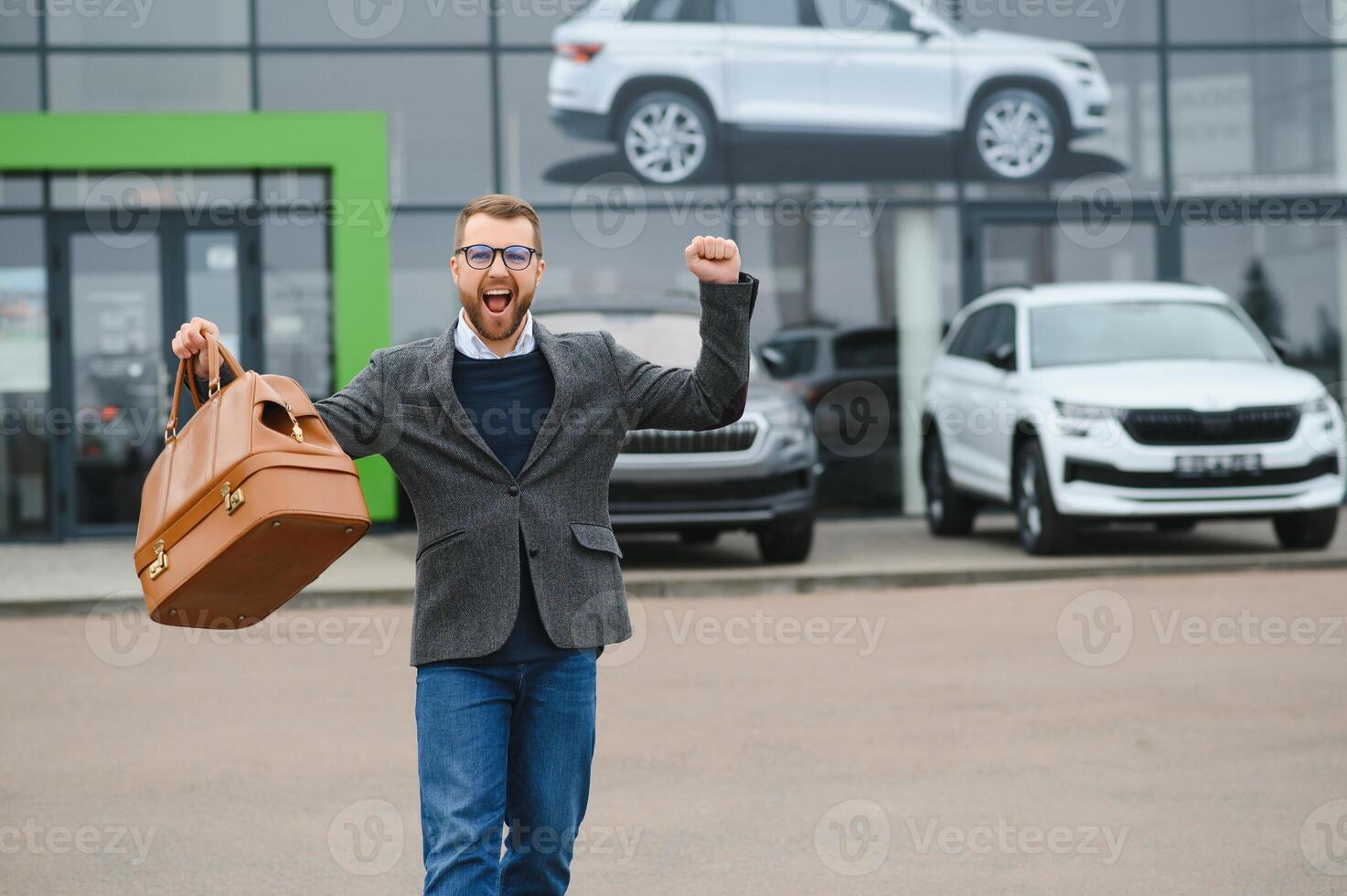 Man minded customer male buyer client in suit choose auto to go look aside want buy new automobile in car showroom vehicle salon dealership store motor show indoor Sales concept photo