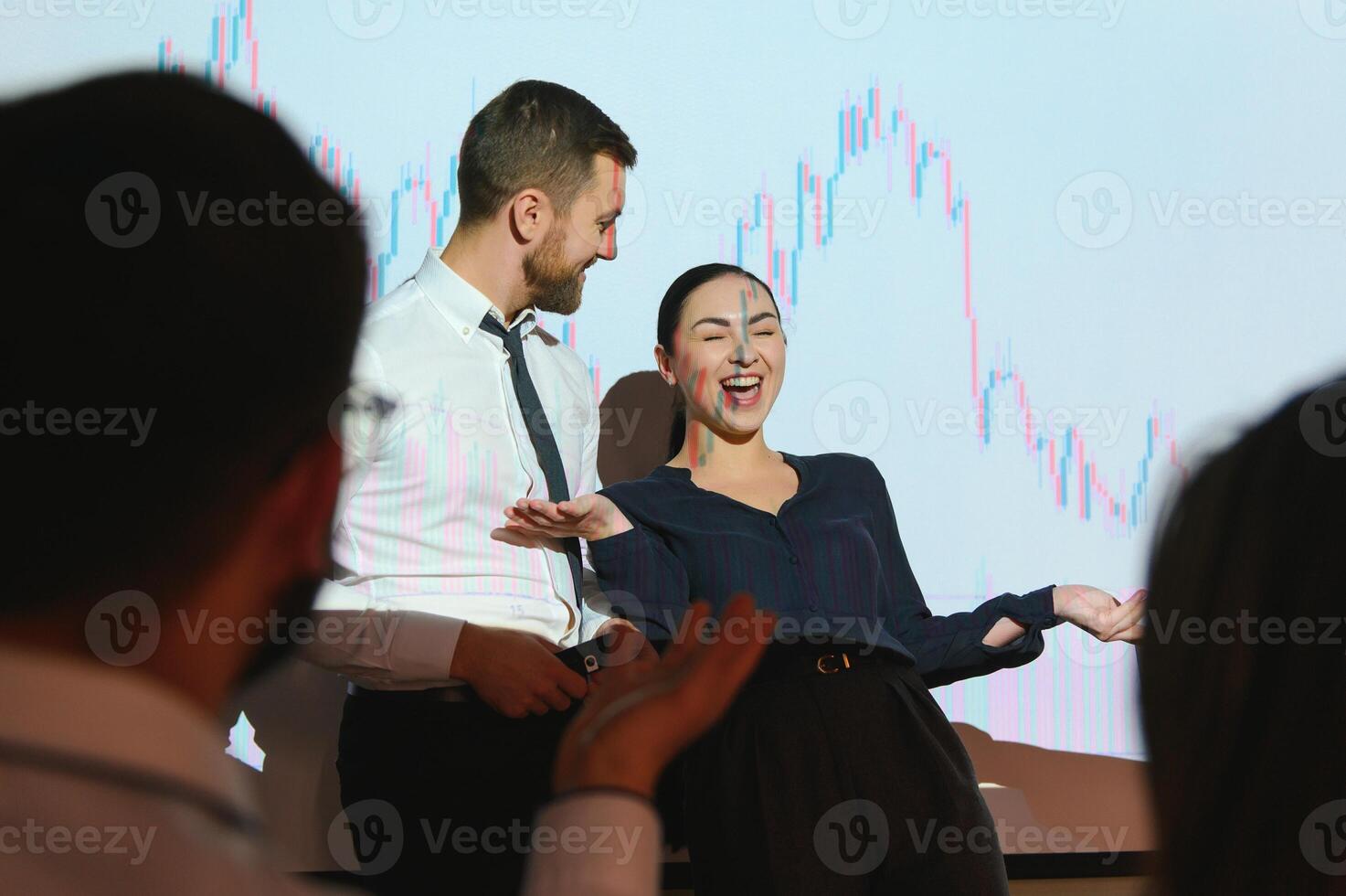 Group of business people working at modern office.Technical price graph, red and blue candlestick chart and stock trading computer screen background. Double exposure. Traders analyzing data photo