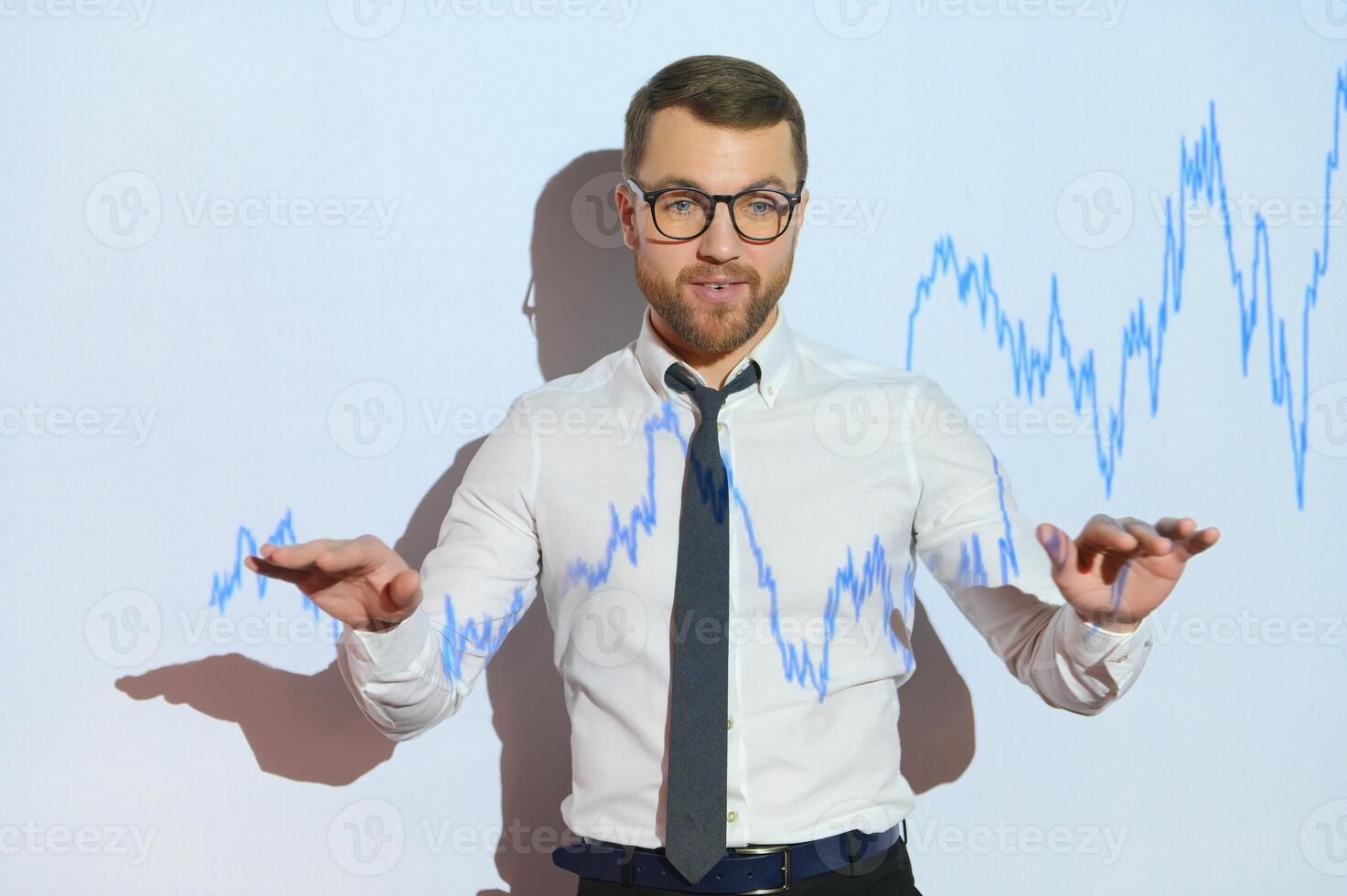Portrait of concerned European businessman thinking in blurry office with double exposure of falling financial chart. Concept of crisis and stock market. photo