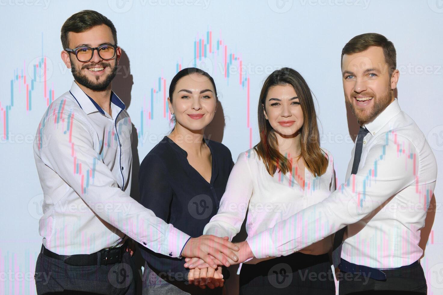 Group of business people working at modern office.Technical price graph, red and blue candlestick chart and stock trading computer screen background. Double exposure. Traders analyzing data photo