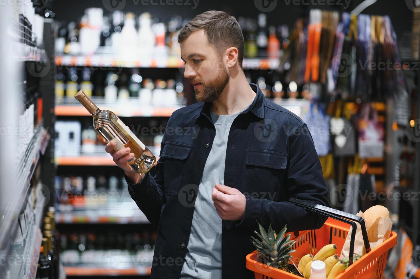 man in supermarket, grocery store customer photo
