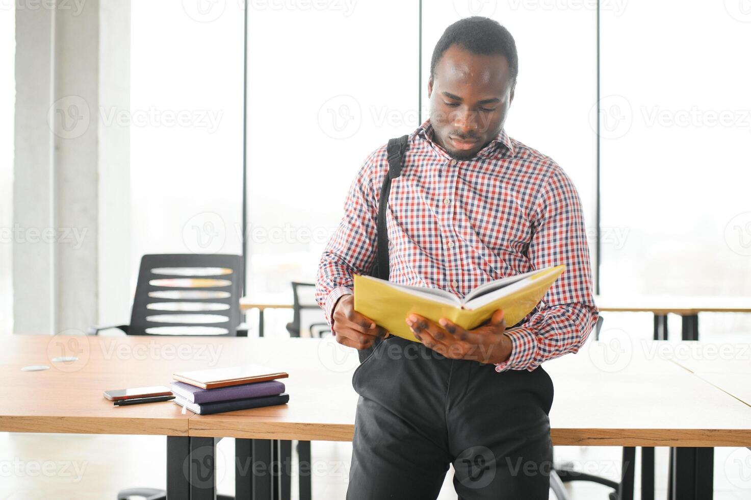 Portrait of african boy at college campus photo