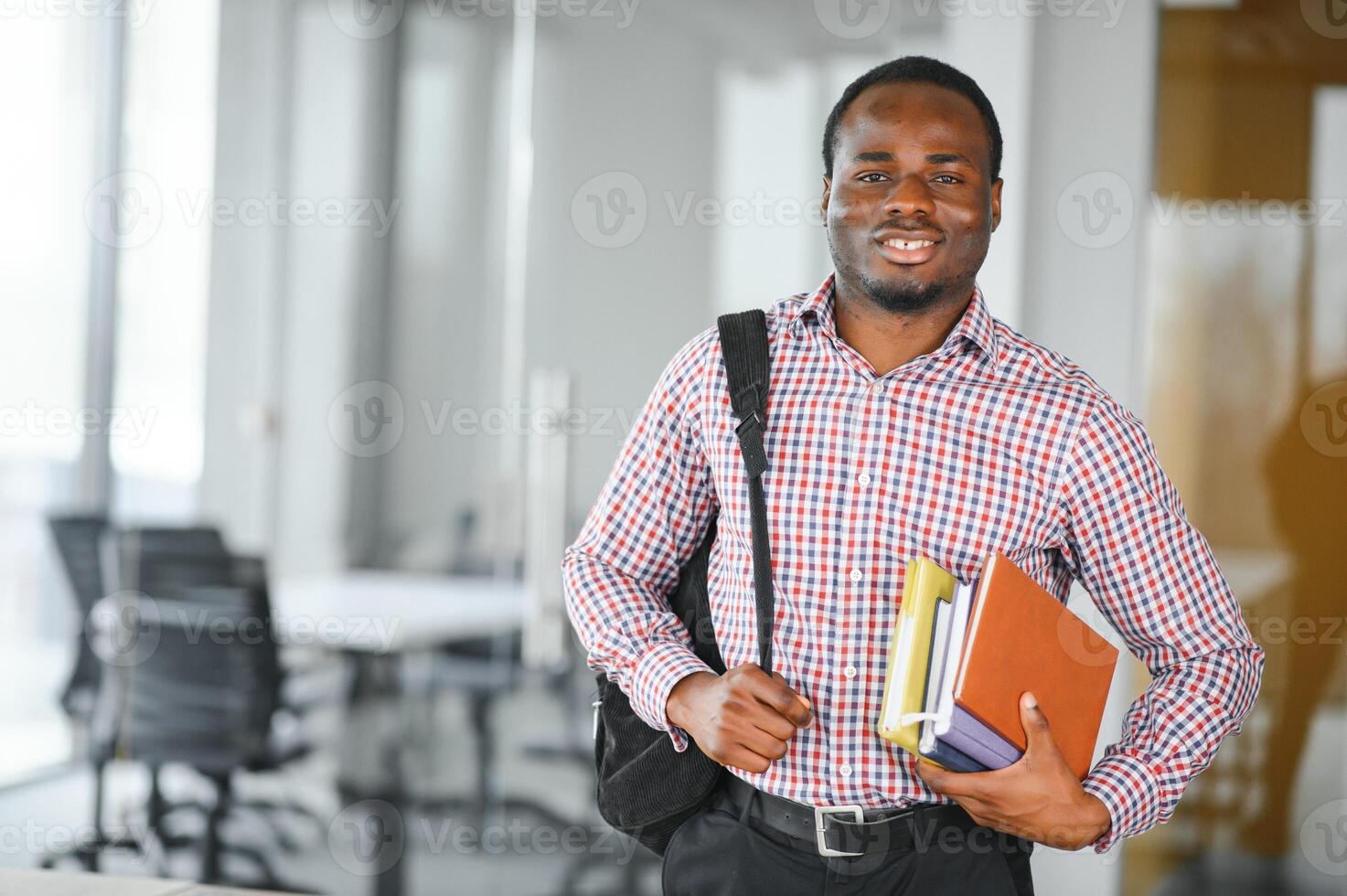 black student at university classroom and thinking of something photo