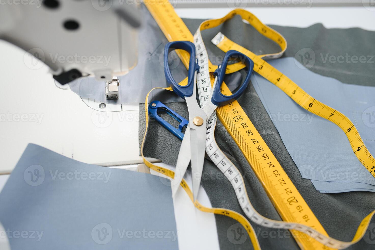 sewing machine, needle, scissors and sewing tools photo