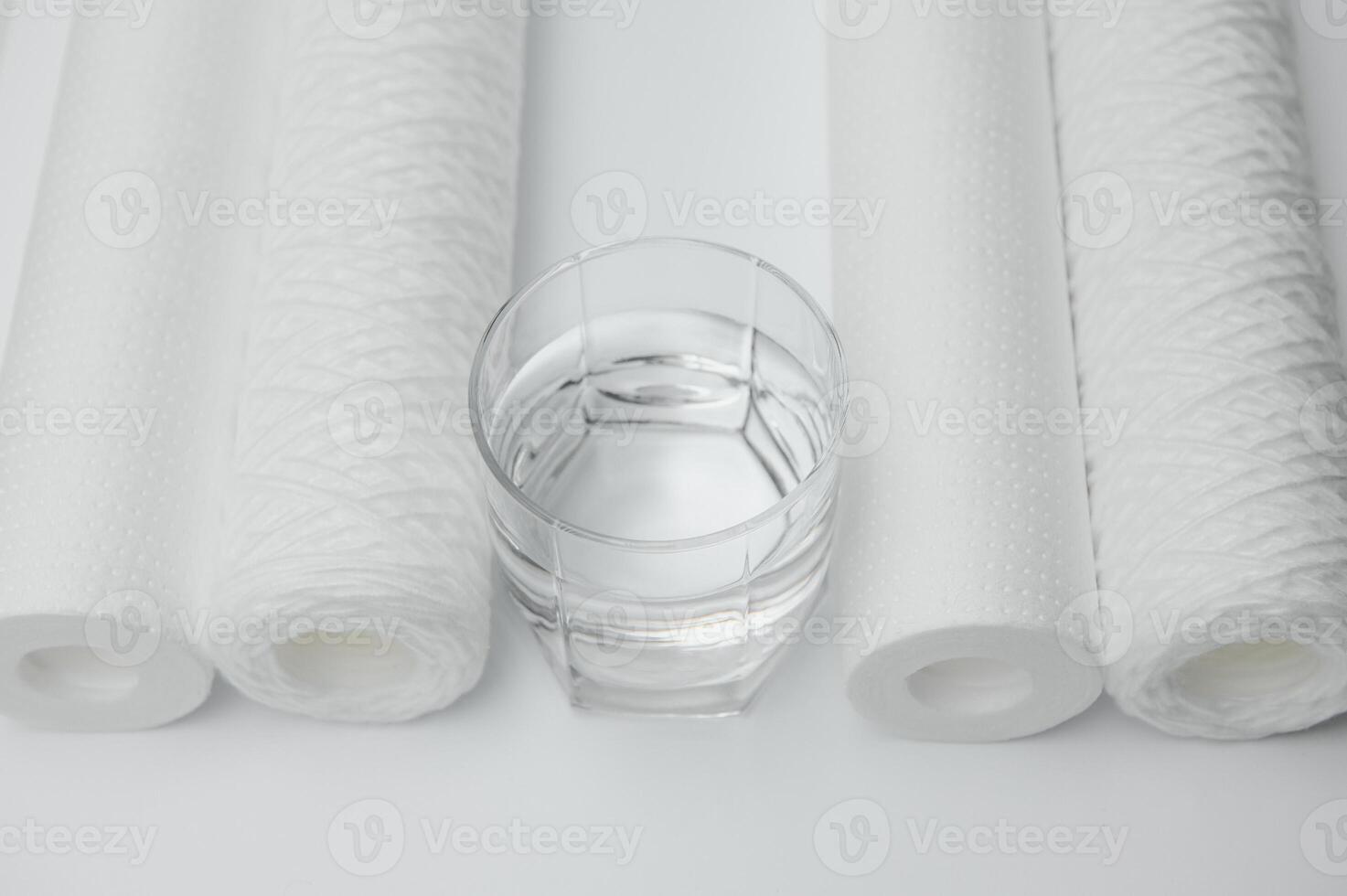 filter cartridges for water on a white background. Installation of reverse osmosis water purification system. photo