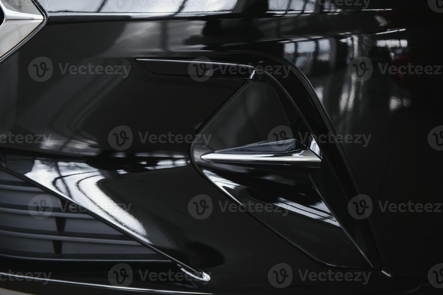elements of the design of a modern car in a car showroom photo