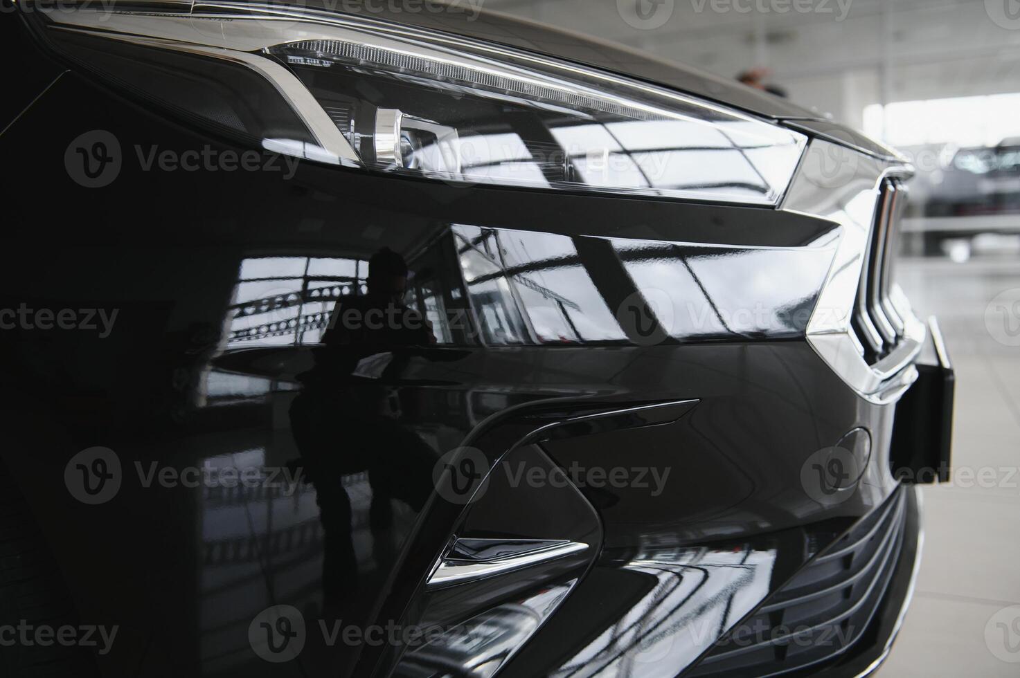 elements of the design of a modern car in a car showroom photo