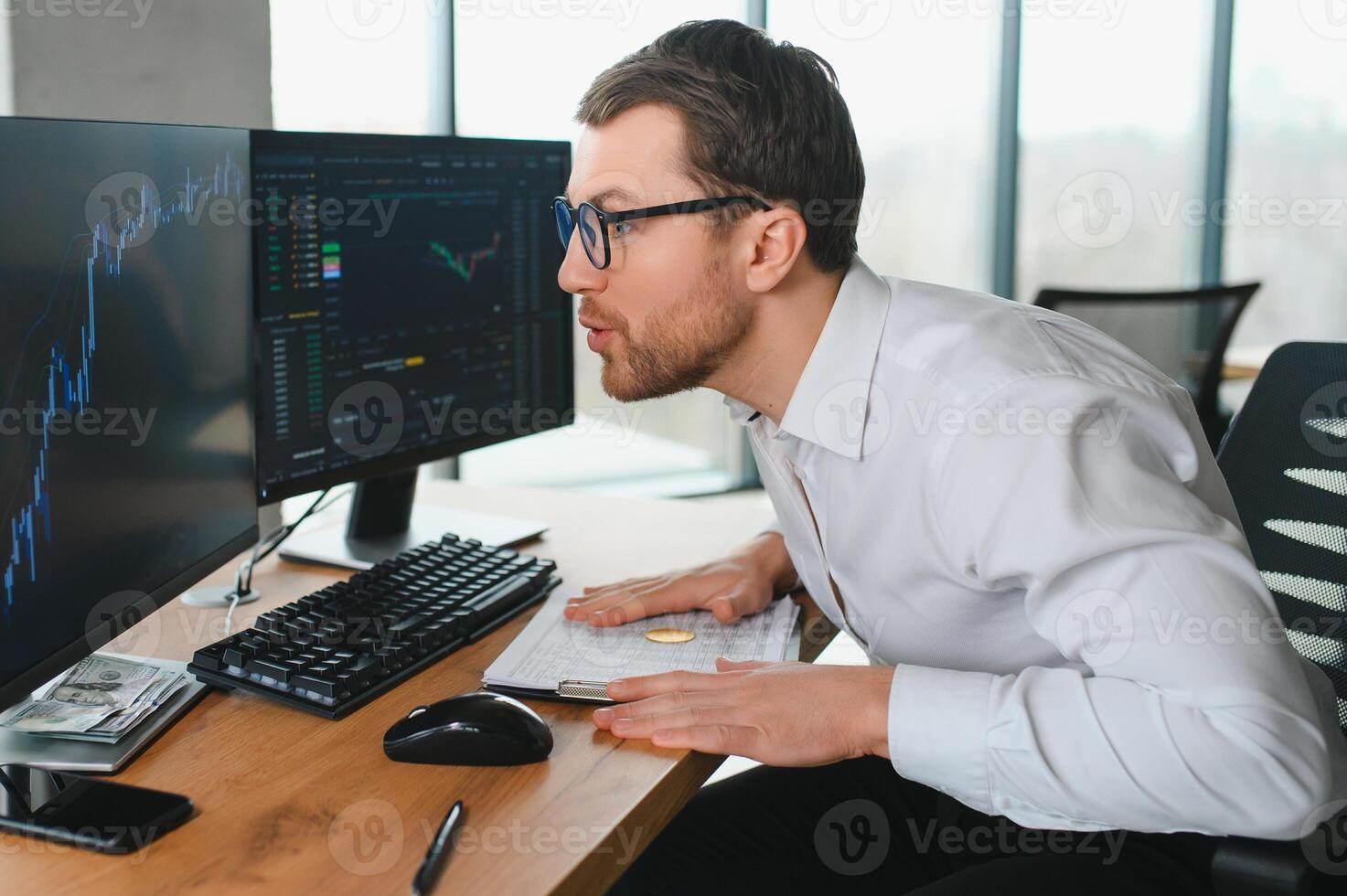Serious business man trader analyst looking at computer monitor, investor broker analyzing indexes, financial chart trading online investment data on cryptocurrency stock market graph on pc screen. photo