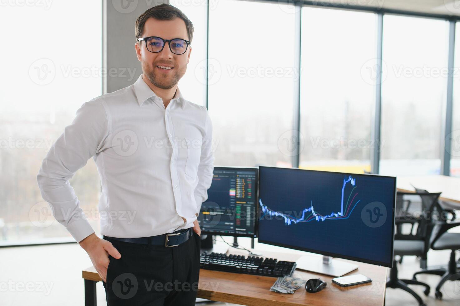 Serious business man trader analyst looking at computer monitor, investor broker analyzing indexes, financial chart trading online investment data on cryptocurrency stock market graph on pc screen. photo